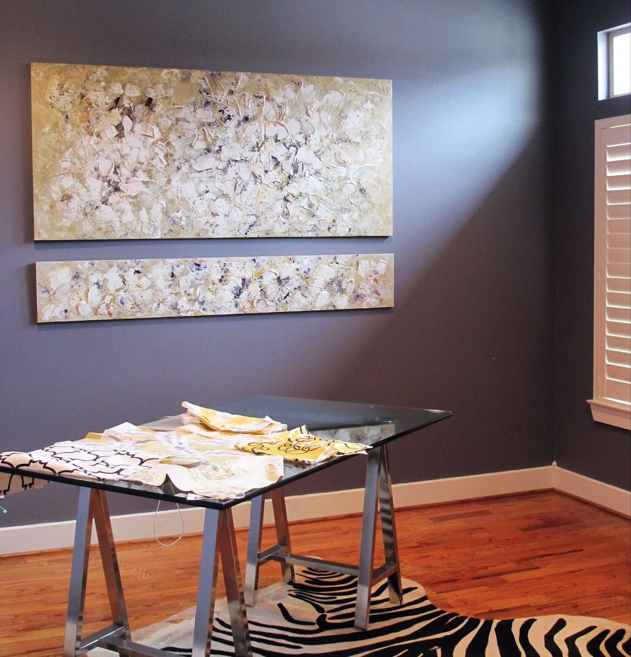 Pair of long textured paintings by Joanna Purvis in a home office