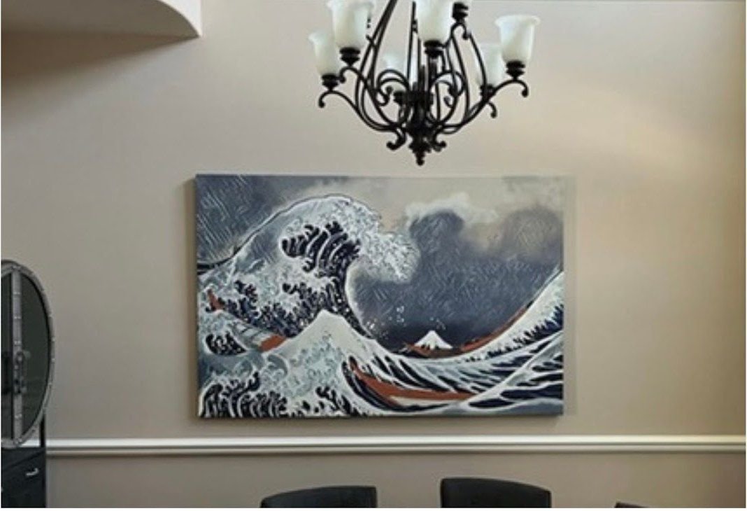 Large wave painting by Joanna Purvis in a dining room